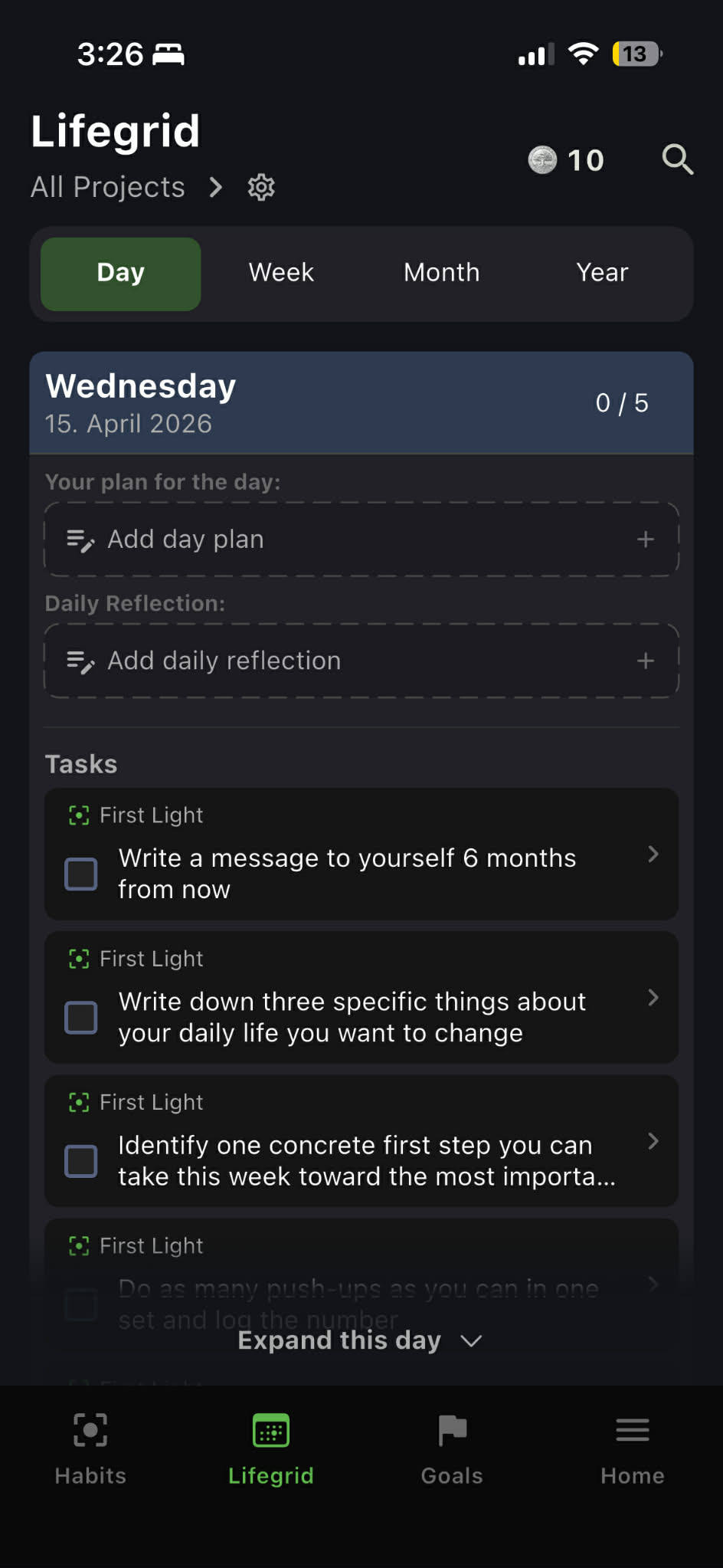 Tasks view on the Lifegrid showing tasks grouped by period with completion checkboxes